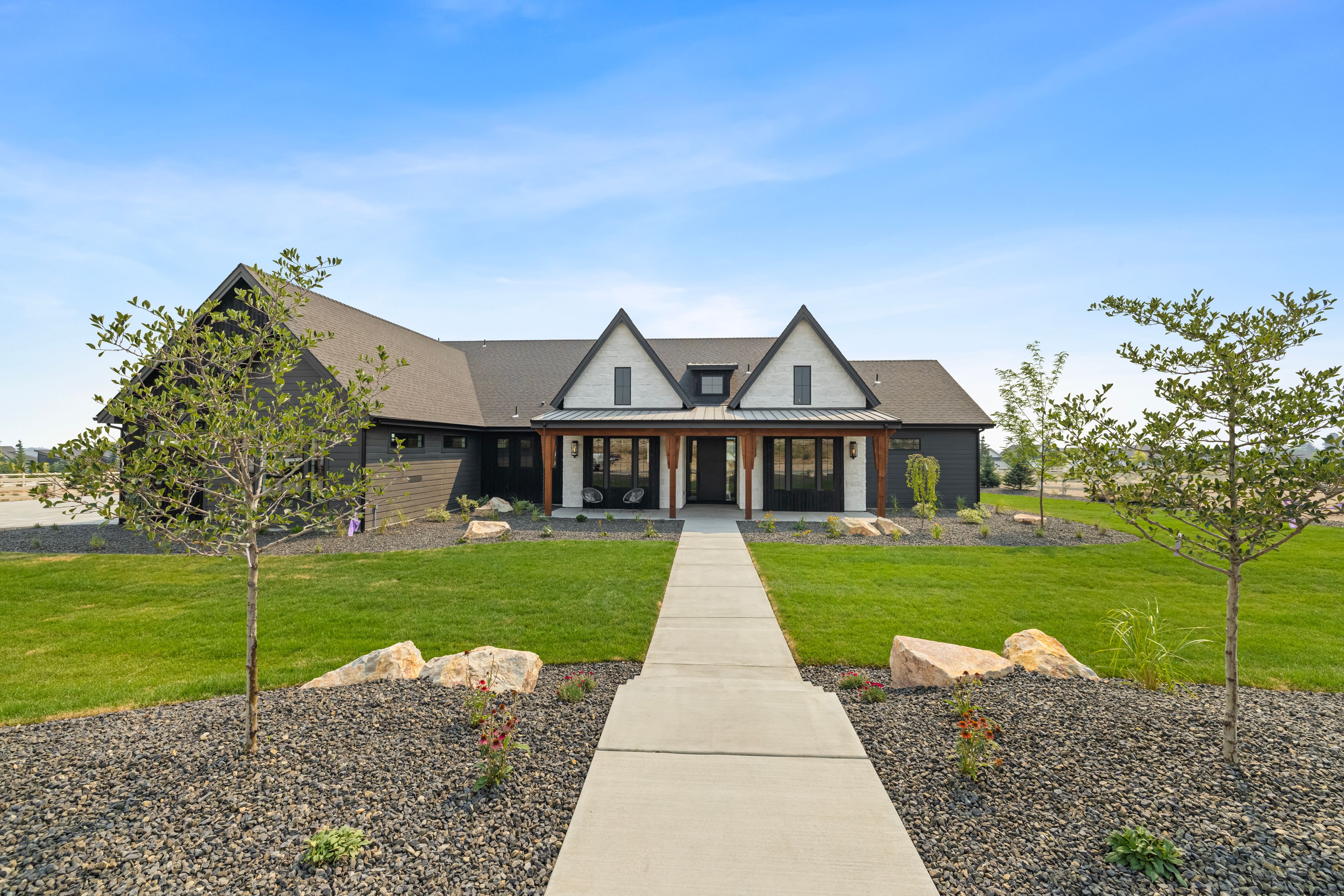 Sawtooth exterior detail — entry and facade