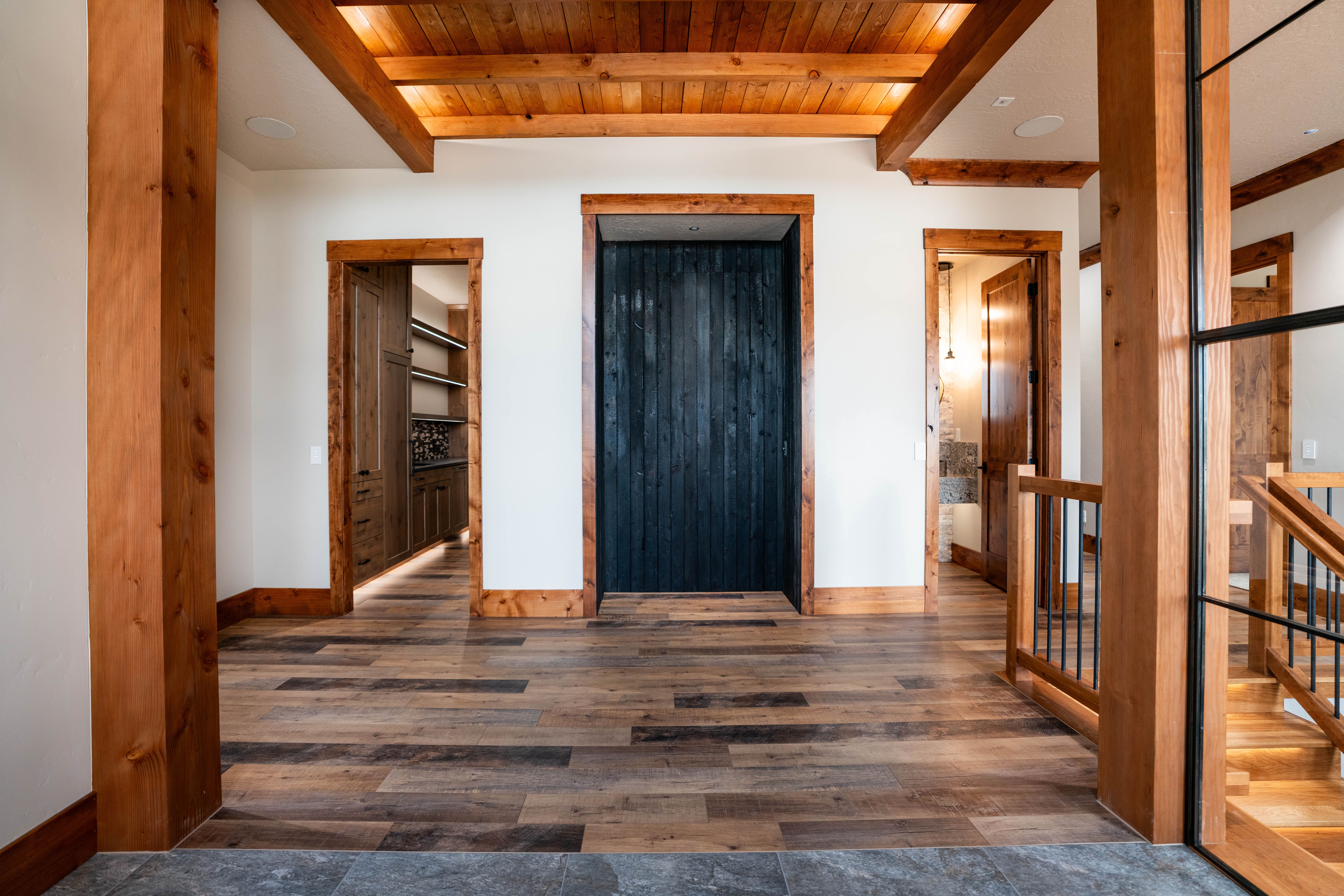 Hawk Nest estate home — wide exterior view from the approach drive, Middleton Idaho